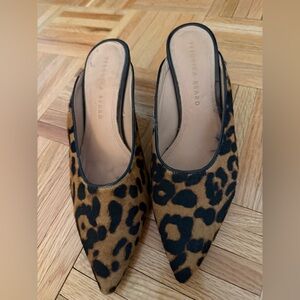 Veronica Beard Animal Print Mules in Black and Tan